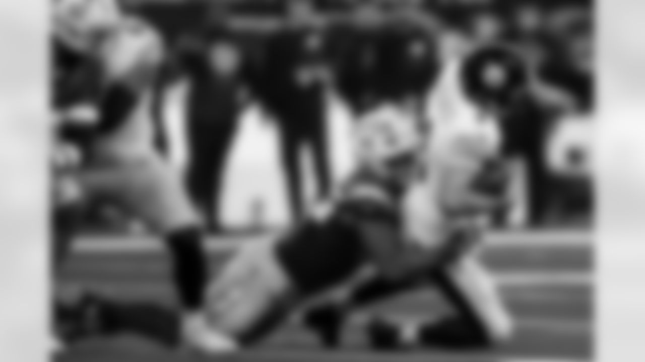 Chargers OLB Tuli Tuipulotu (#45) in action during their Pro Bowl season.