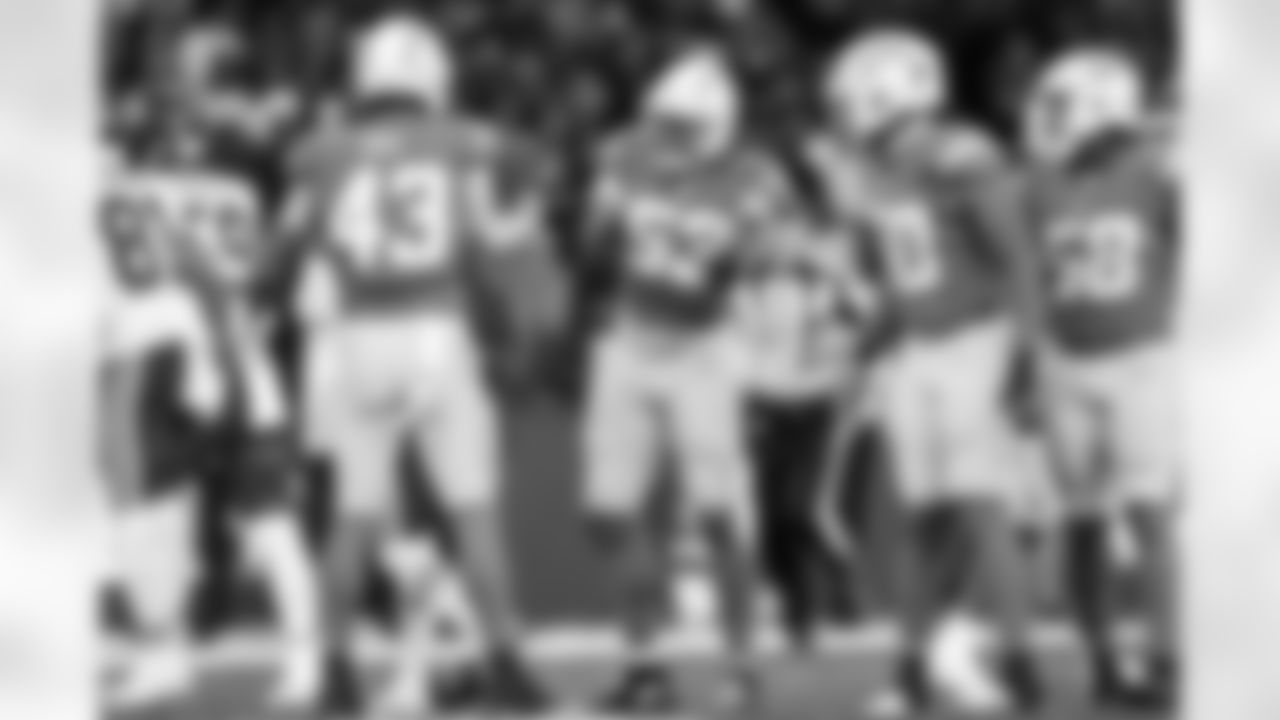 LB Troy Dye (43), LB Del'Shawn Phillips (53) and OLB Caleb Murphy (50)