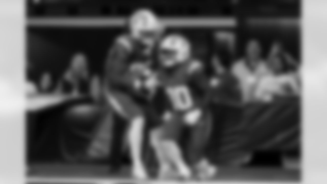 TE Oronde Gadsden (86) and RB Kimani Vidal (30)