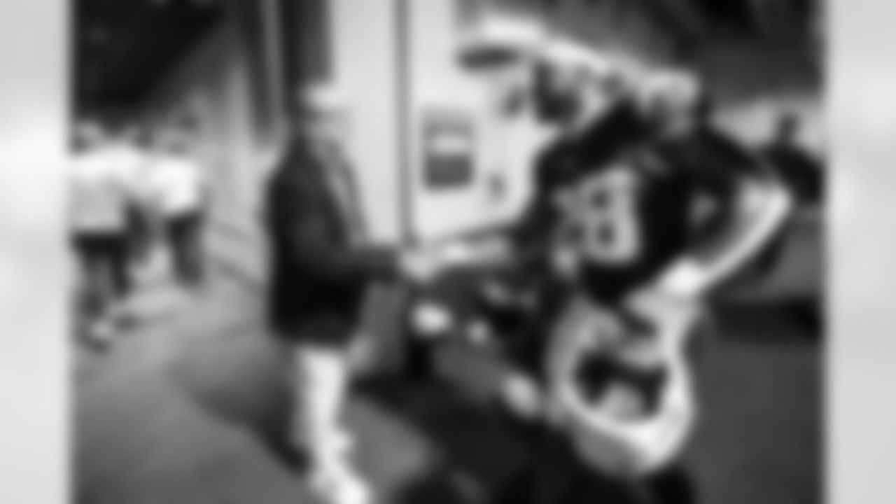 Dean Spanos and RB Hassan Haskins (28)