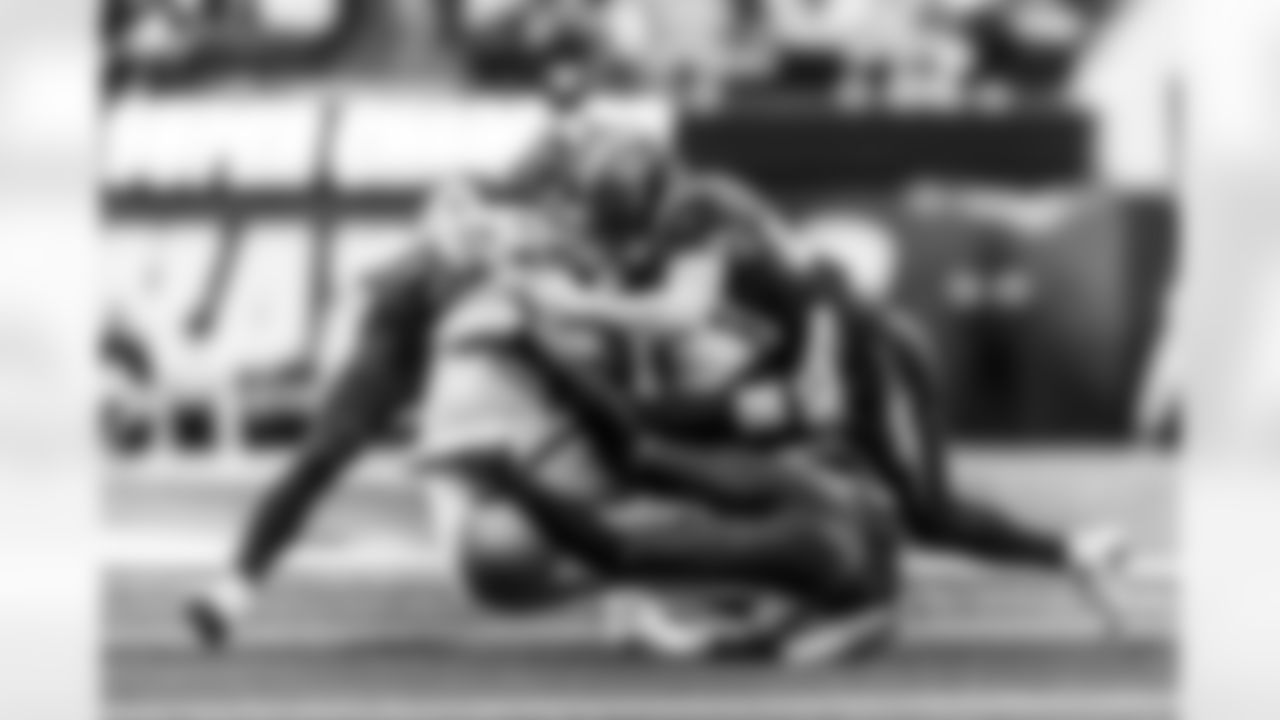 Take a look back at the Chargers Week 13 matchup with the Raiders in monochrome.