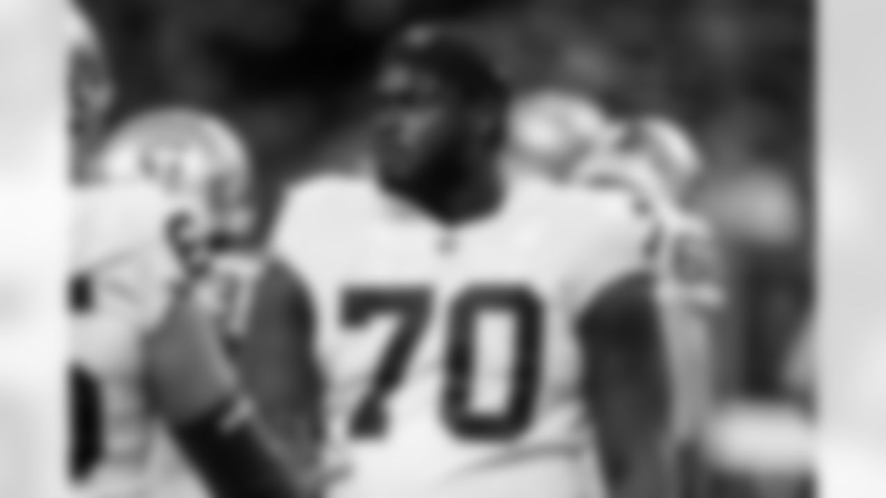 Las Vegas Raiders guard Alex Leatherwood (70) warms up on the field before an NFL football game against the Indianapolis Colts, Sunday, Jan. 2, 2022, in Indianapolis. (AP Photo/Zach Bolinger)