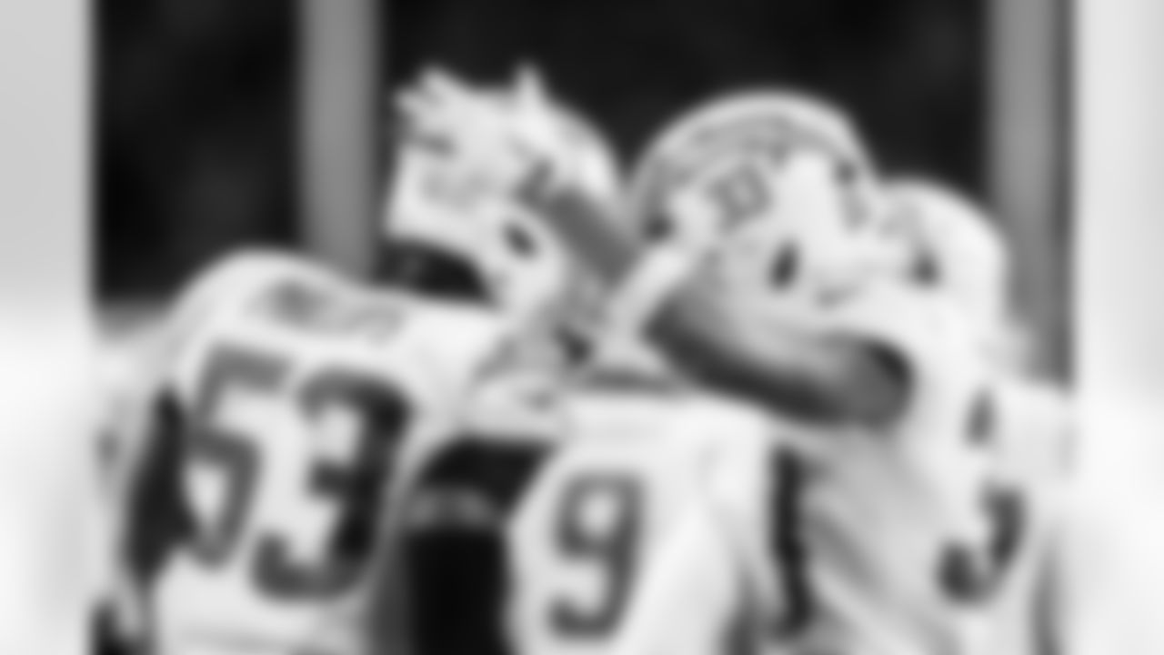 LB Del'Shawn Phillips (53) and DB Deane Leonard (33)