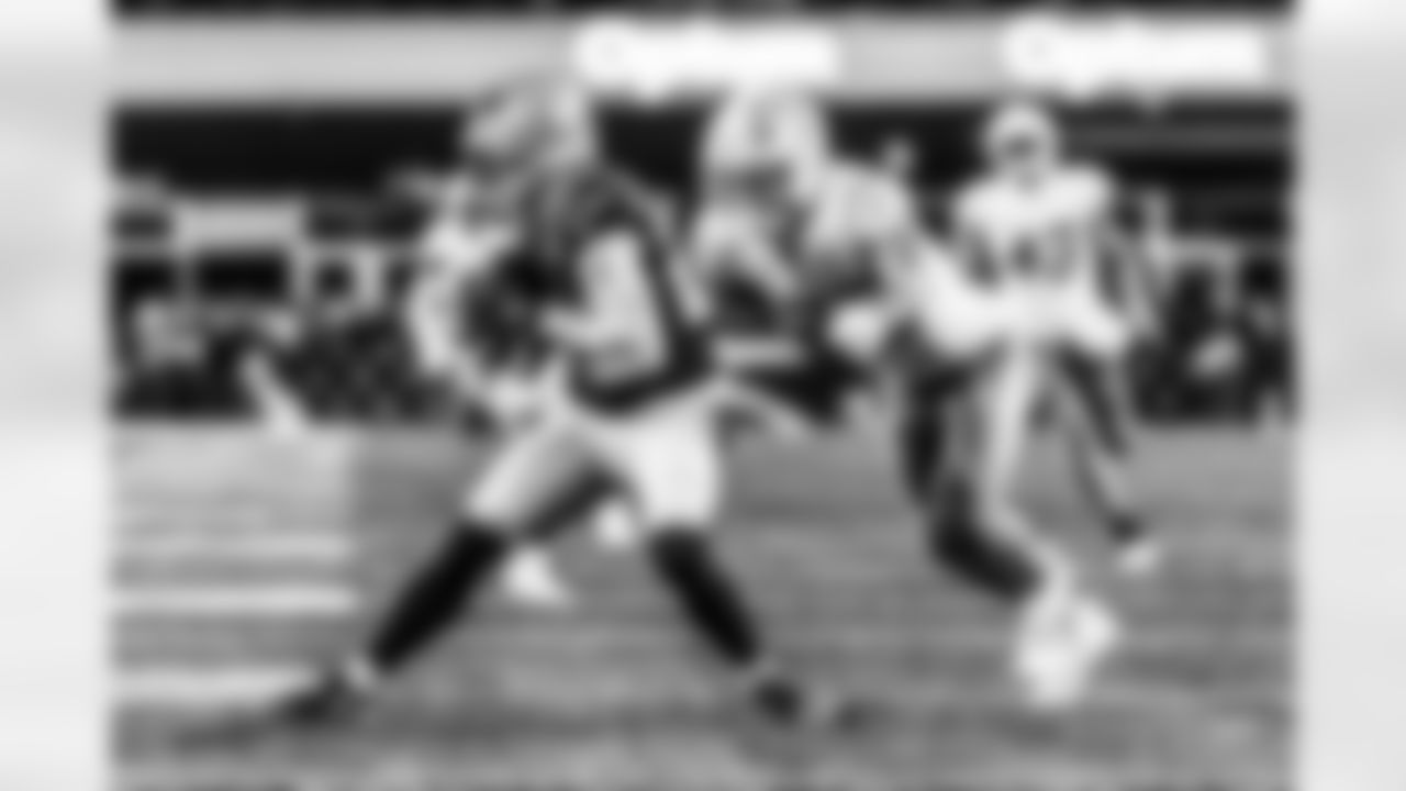 Take a look back at the Chargers Wild Card matchup with the Patriots in monochrome.