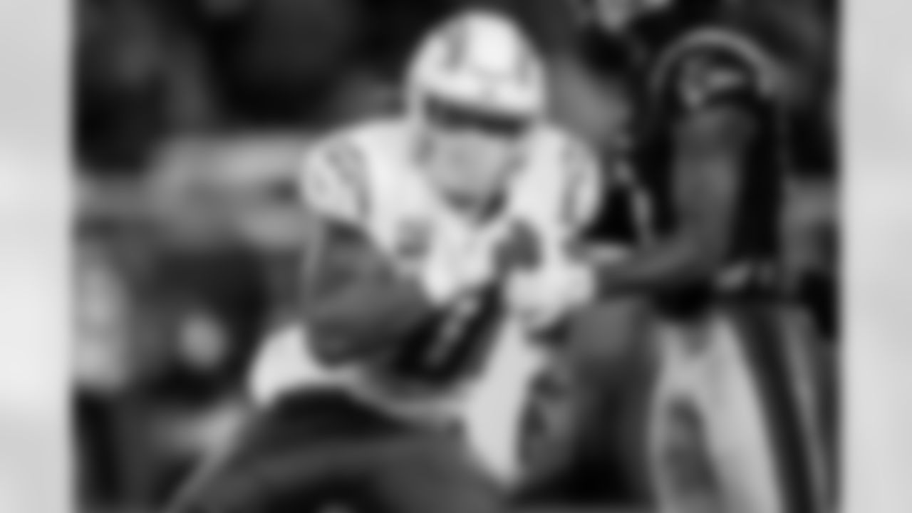 Check out the best shots from the Chargers Wild Card matchup against the Patriots!