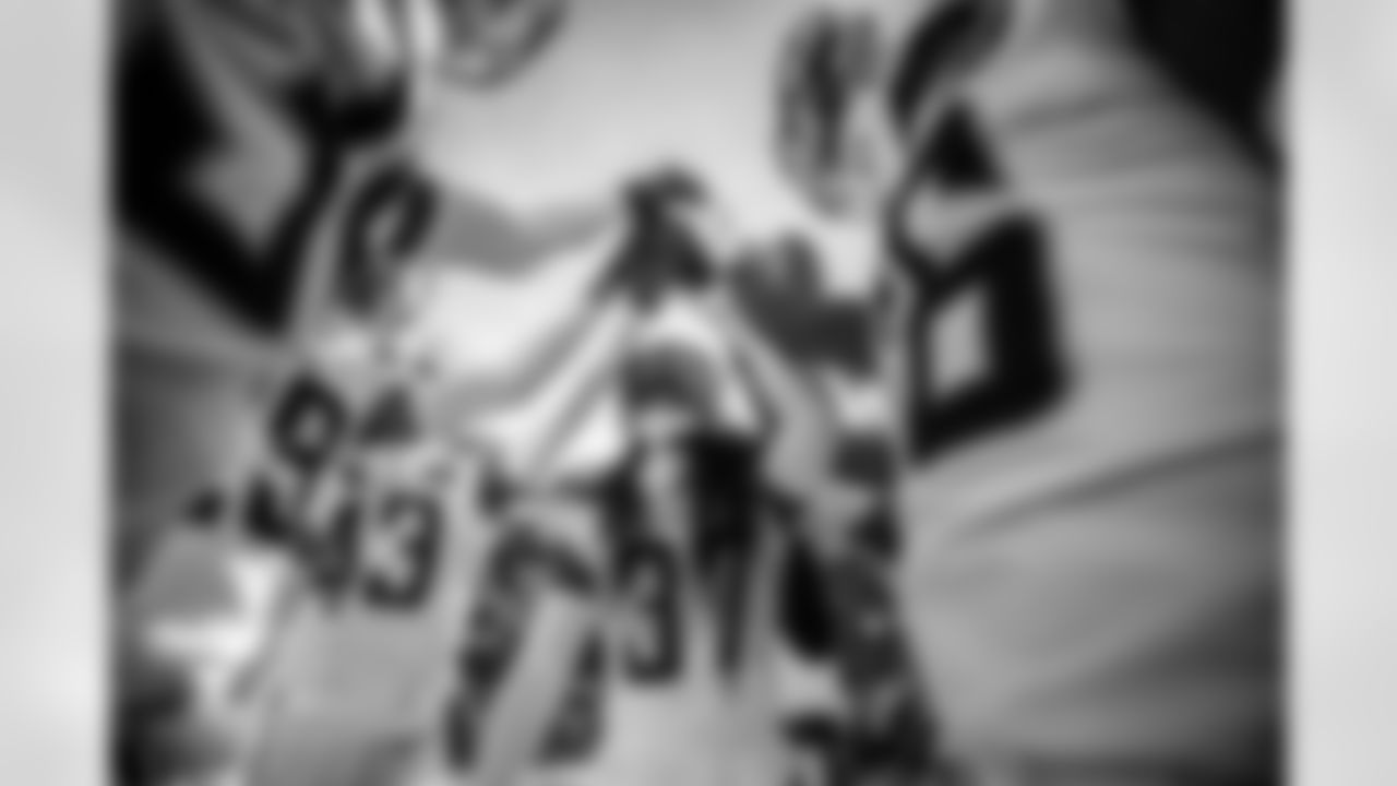 Relive the Chargers' postseason appearances through images from playoff games, highlighting the moments that defined the team in the NFL playoffs.