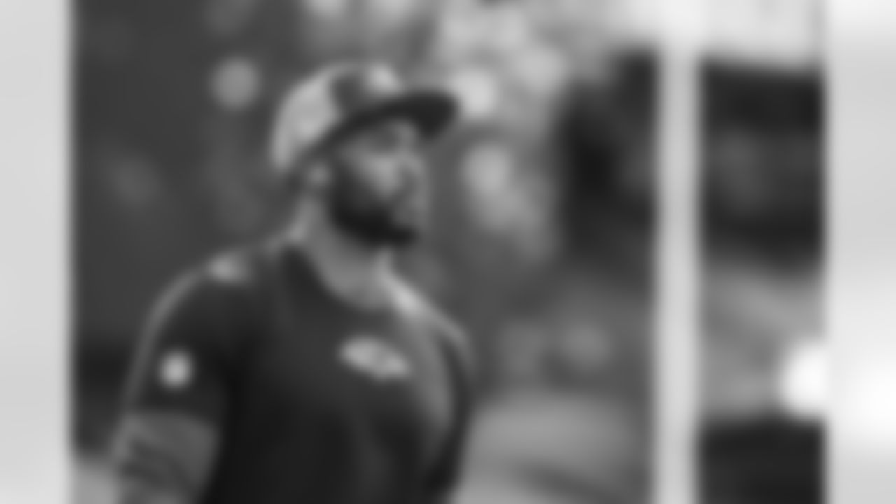 Baltimore Ravens defensive coordinator Zach Orr walks on the field during pre-game warm-ups before an NFL football game against the Chicago Bears, Sunday, Oct. 26, 2025, in Baltimore. (AP Photo/Terrance Williams)