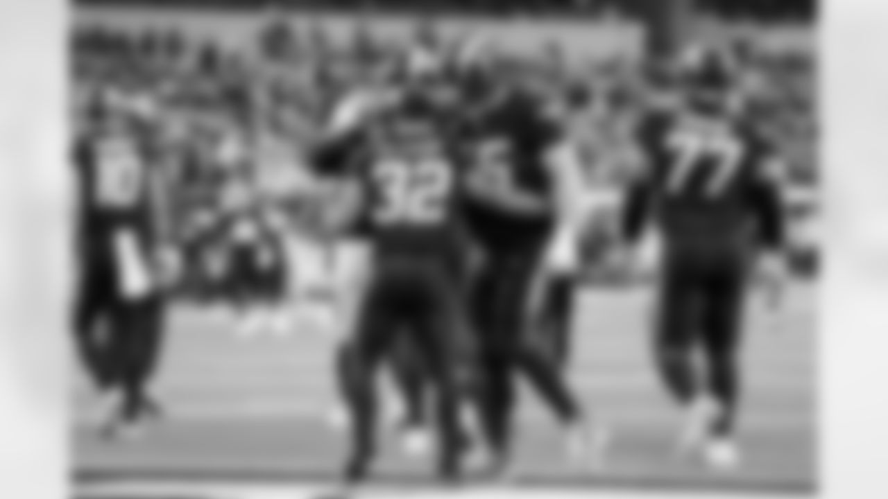 RB Jaret Patterson (32) and C Bradley Bozeman (75)