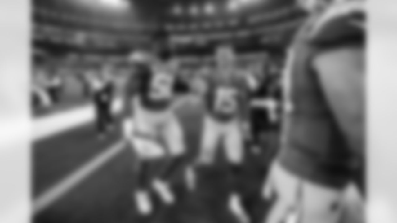 OLB Khalil Mack (52) and WR Ladd McConkey (15)