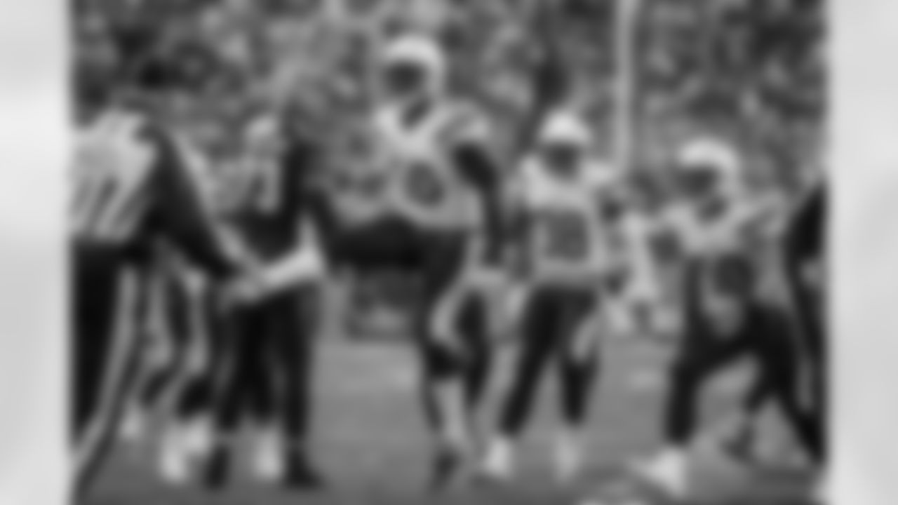 Relive the Chargers' postseason appearances through images from playoff games, highlighting the moments that defined the team in the NFL playoffs.