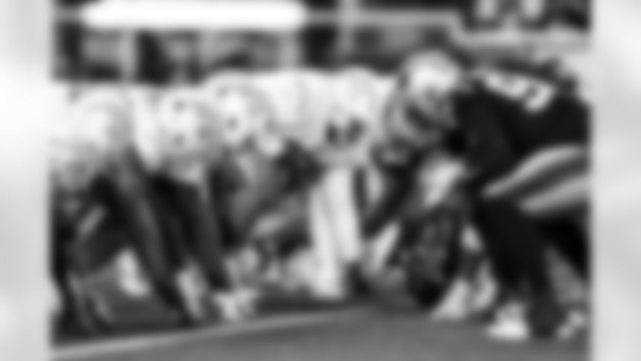 OLB Odafe Oweh (98) and DL Justin Eboigbe (92)