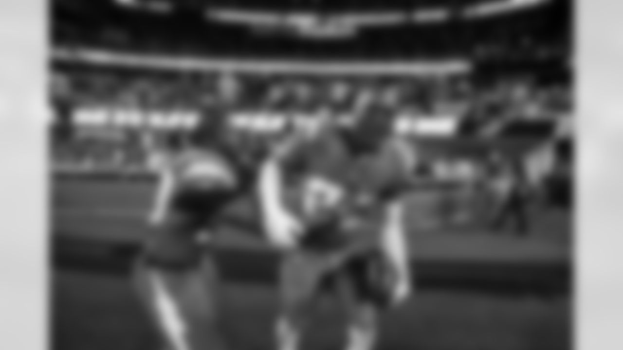 LB Del'Shawn Phillips (53) and S Tony Jefferson (23)