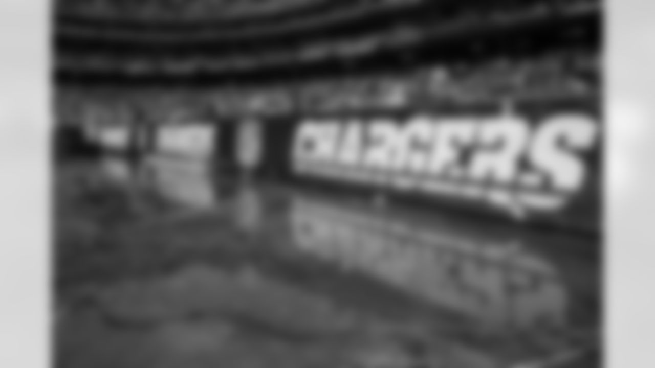 Relive the Chargers' postseason appearances through images from playoff games, highlighting the moments that defined the team in the NFL playoffs.