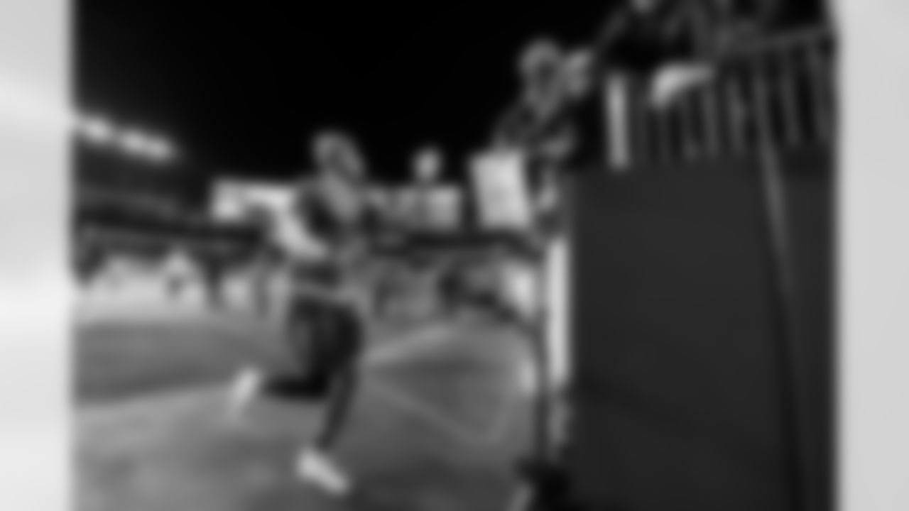 Check out the best shots from the Chargers Wild Card matchup against the Patriots!