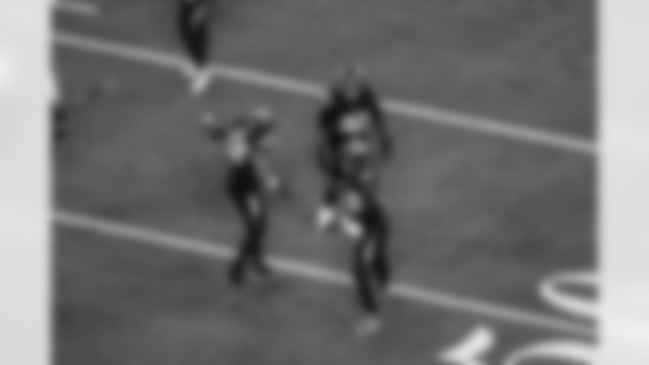 OLB Khalil Mack (52), DL Justin Eboigbe (92) and OLB Odafe Oweh (98)