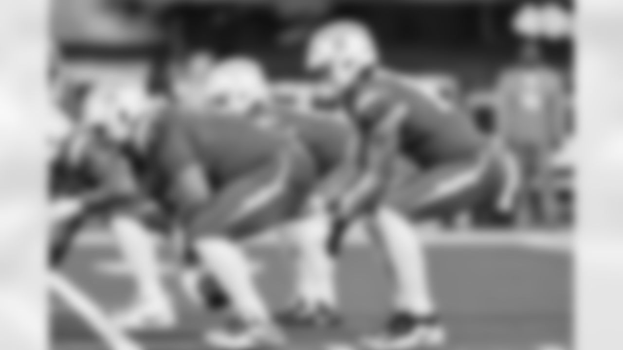 C Bradley Bozeman (75) and QB Justin Herbert (10)