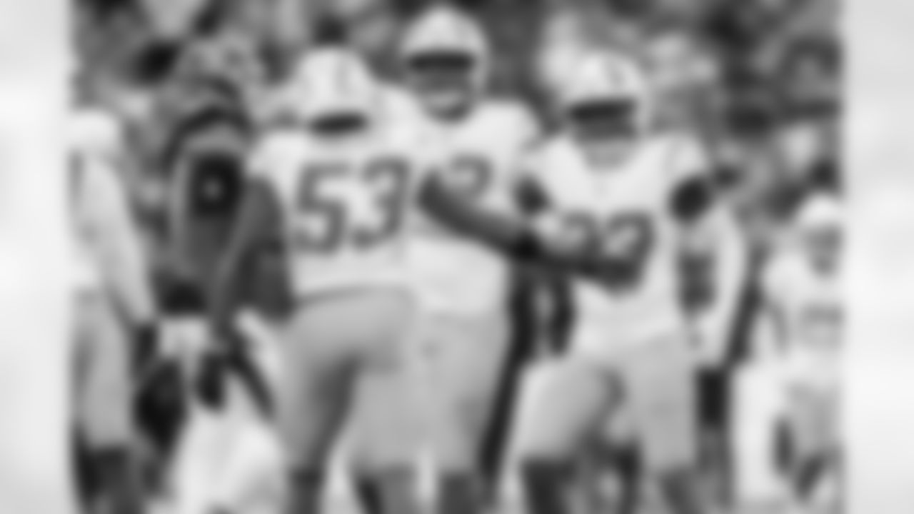 LB Del'Shawn Phillips (53), DL Justin Eboigbe (92) and S Tony Jefferson (23)