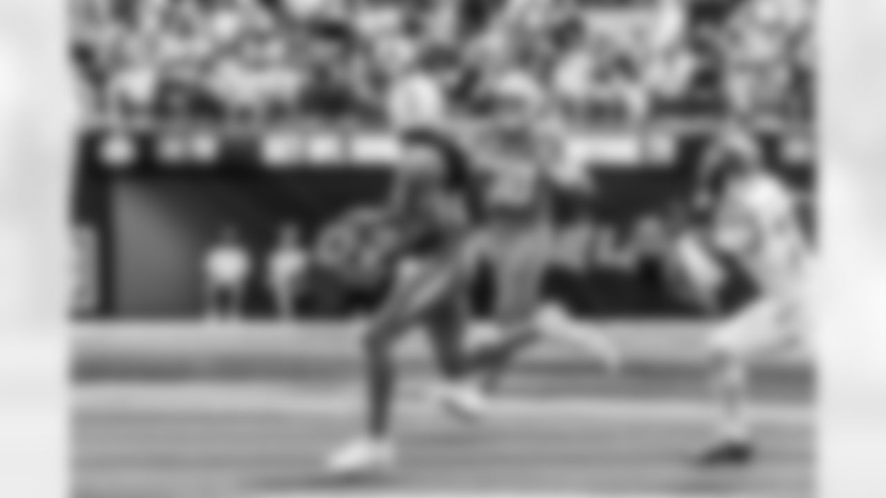Take a look back at the Chargers Week 5 matchup with the Commanders in monochrome!