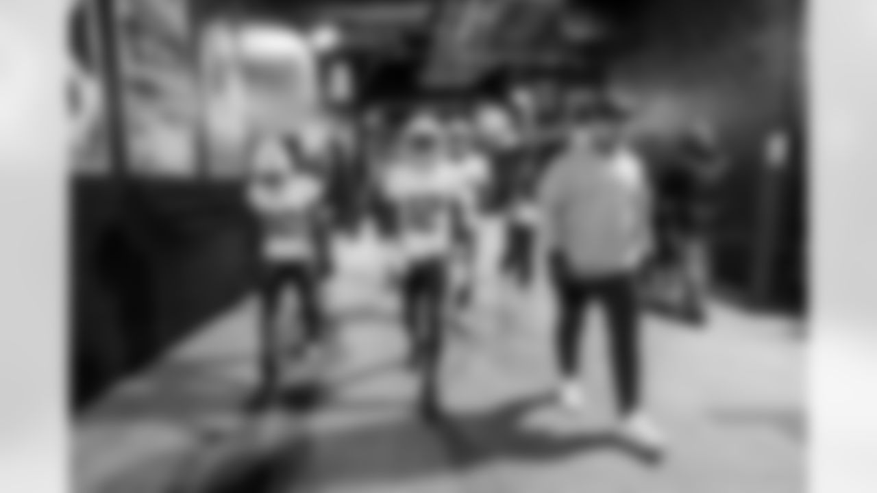 Check out the best shots from the Chargers Wild Card matchup against the Patriots!