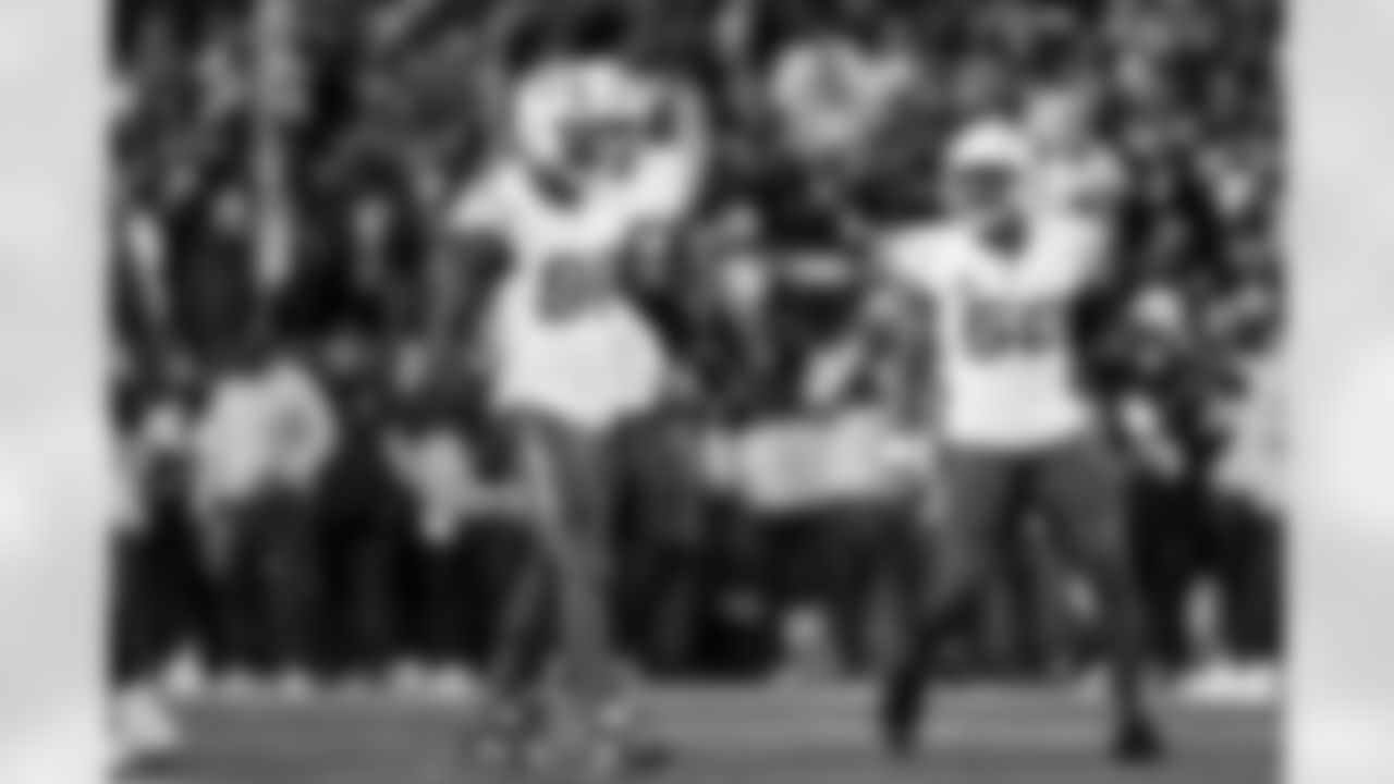 OLB Odafe Oweh (98) and OLB Khalil Mack (52)