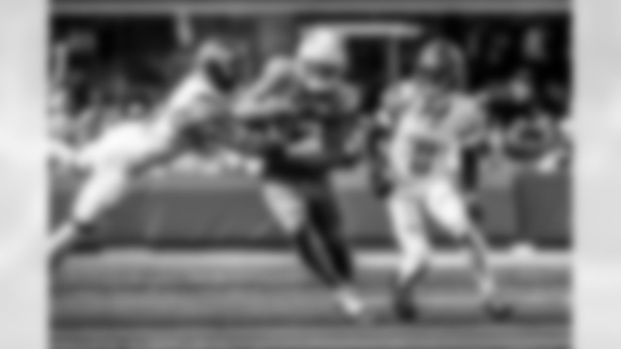 Take a look back at the Chargers Week 5 matchup with the Commanders in monochrome!