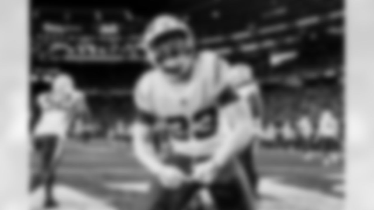 Check out the best shots from the Chargers Wild Card matchup against the Patriots!