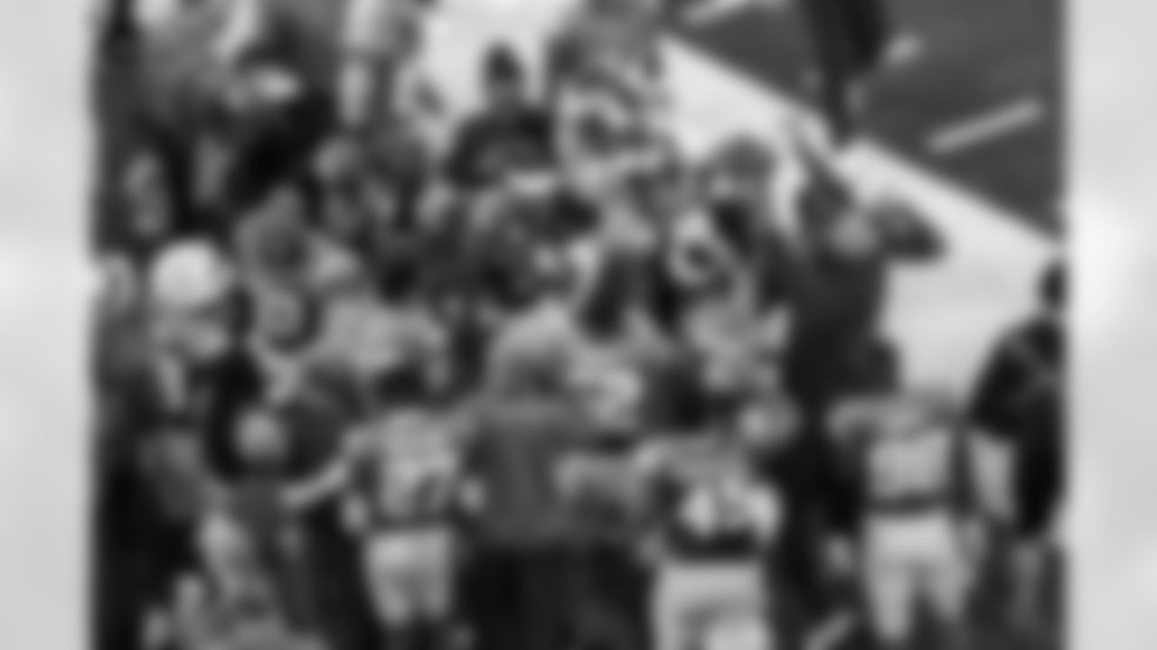 LB Daiyan Henley (0) and WR Keenan Allen (13)