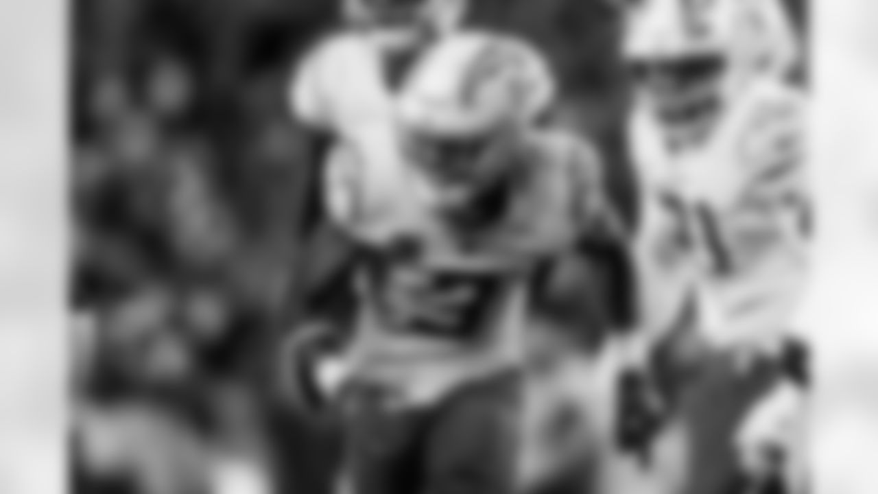 Check out the best shots from the Chargers Wild Card matchup against the Patriots!