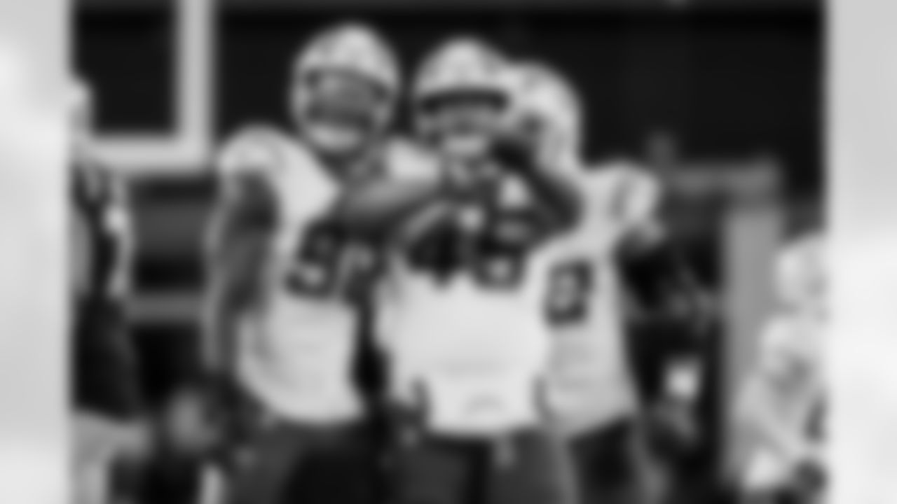 Take a look back at the best photos of Tuli Tuipulotu's 2025 campaign.