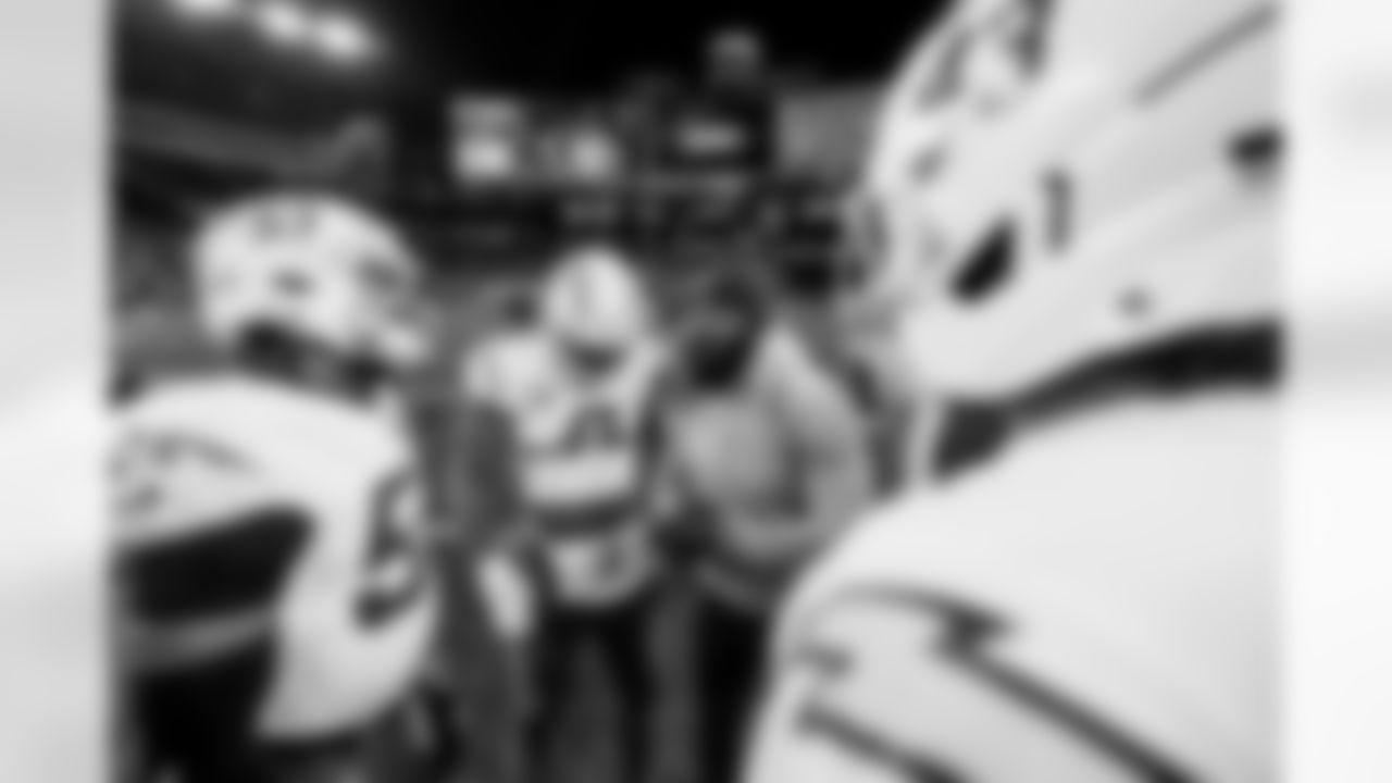 Check out the best shots from the Chargers Wild Card matchup against the Patriots!