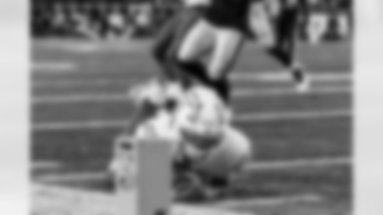 Check out the best shots from the Chargers Wild Card matchup against the Patriots!