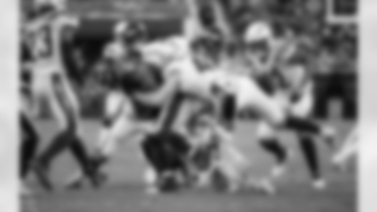 Relive the Chargers' postseason appearances through images from playoff games, highlighting the moments that defined the team in the NFL playoffs.