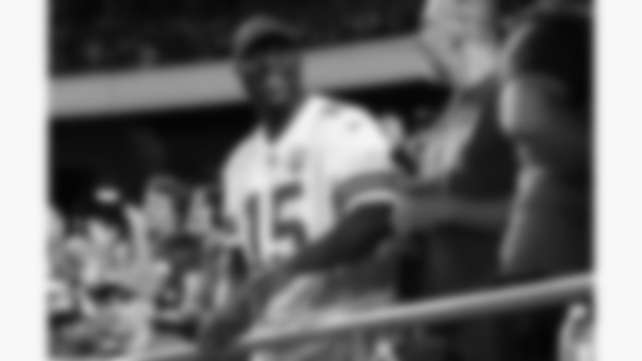 A Kansas City Chiefs fan smiles during the week 6 NFL football game against the Detroit Lions, Sunday, October 12, 2025 in Kansas City, MO.