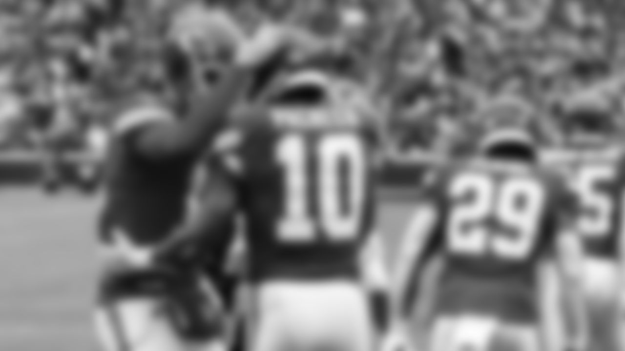 Kansas City Chiefs quarterback Patrick Mahomes (15) and running back Isiah Pacheco (10) celebrate in the end zone during the Week 16 NFL football game on Monday, December 25, 2023 at GEHA Field at Arrowhead Stadium.