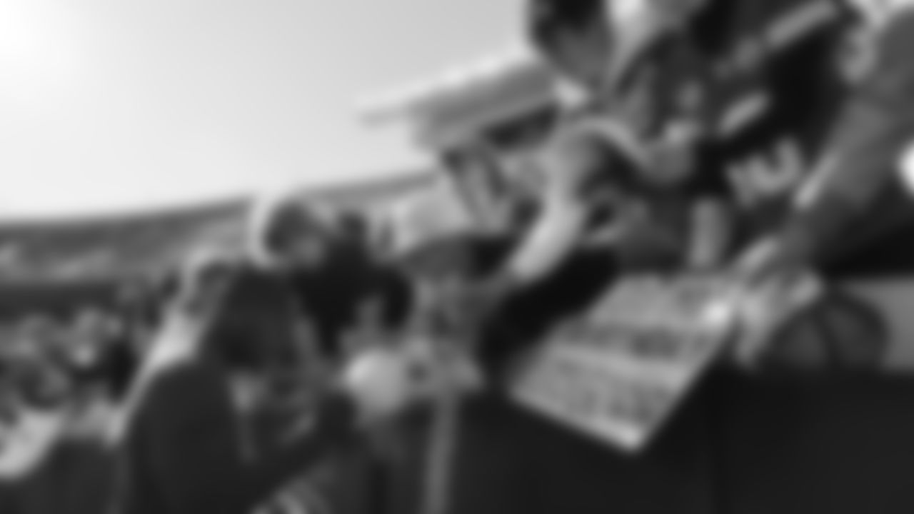 Kansas City Chiefs linebacker Jeffrey Bassa (31) signs autographs for fans prior to a week 7 NFL Football game against the Las Vegas Raiders on Sunday, October 19, 2025 in Kansas City, MO.