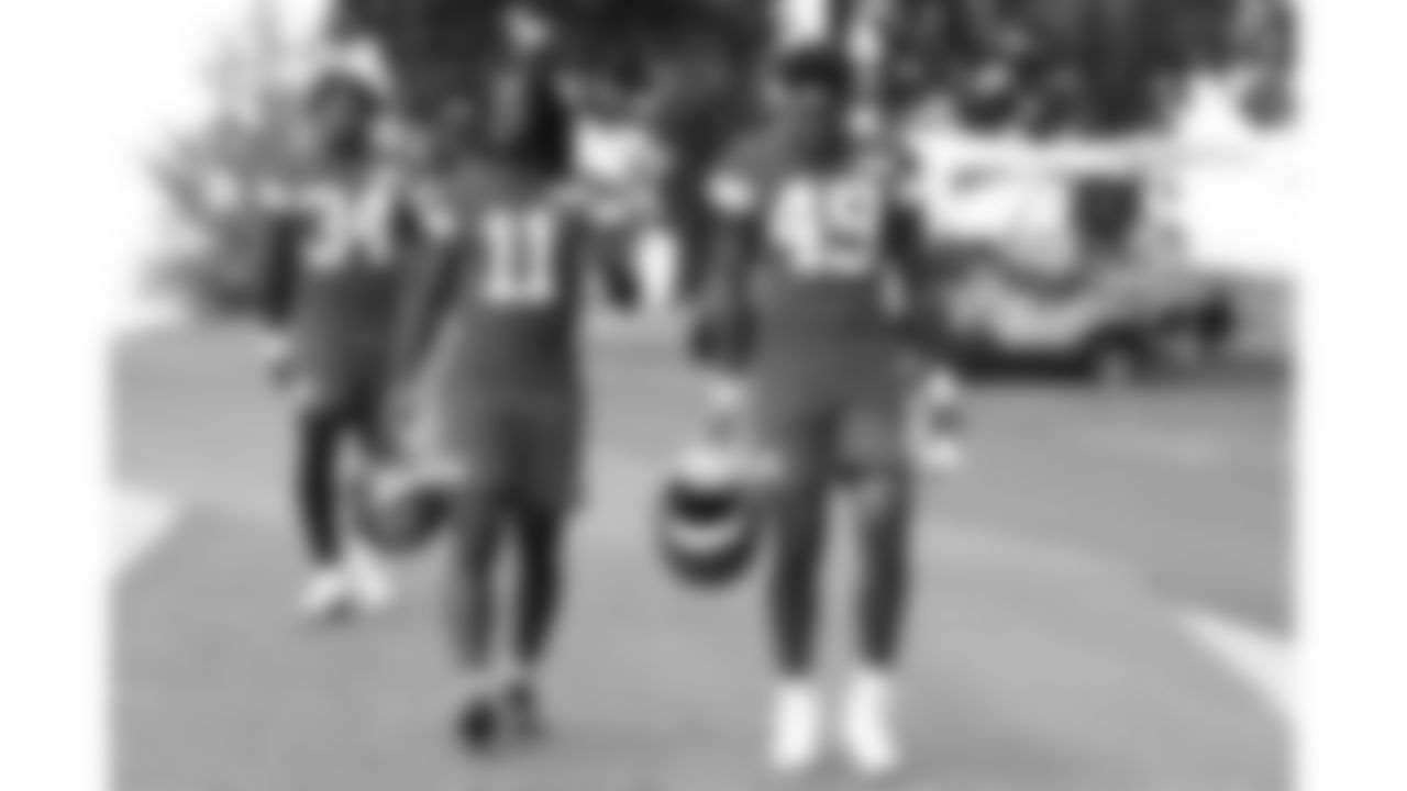 Kansas City Chiefs wide receiver Jalen Royals (11) and tight end Tre Watson (49) arrive at day 11 of training camp practice on Sunday, August 3, 2025.