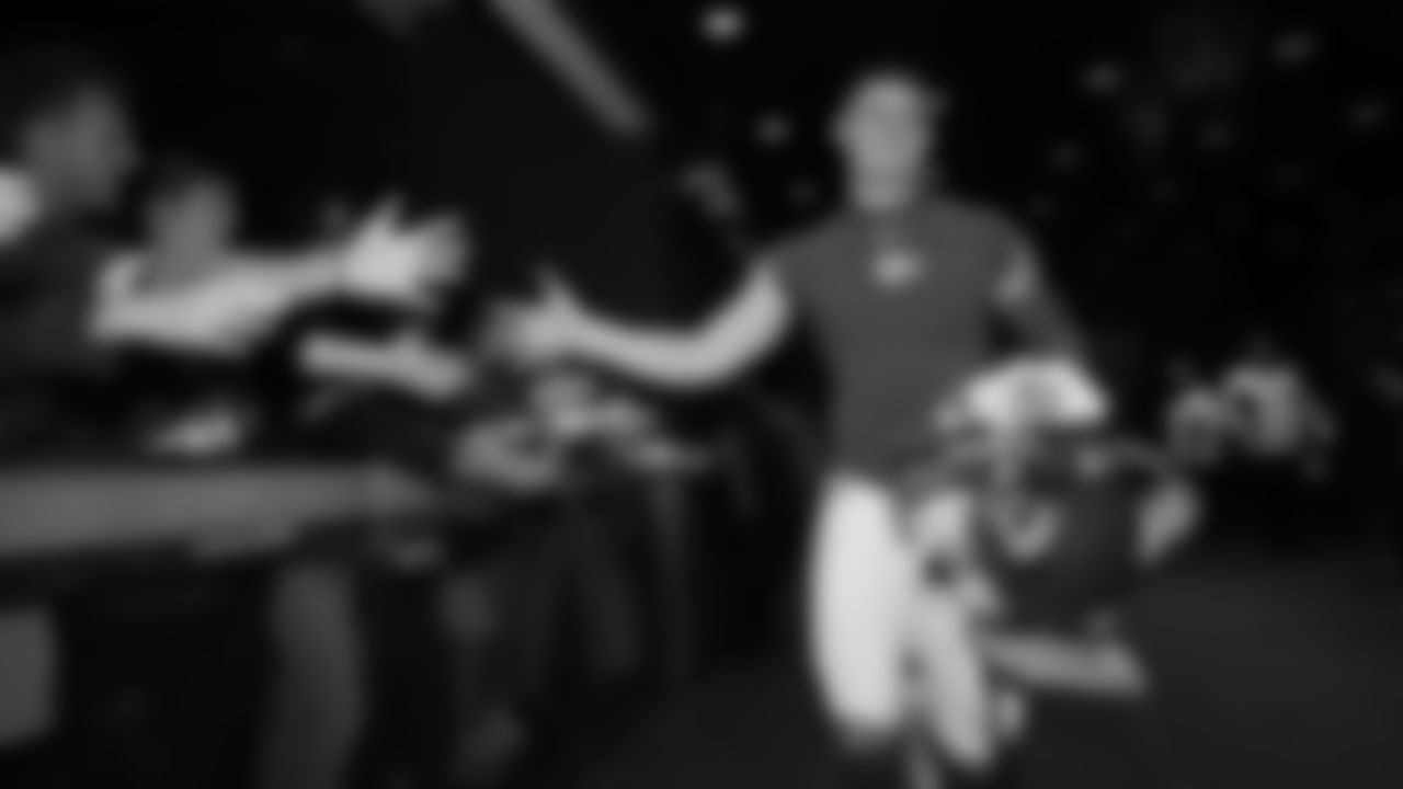 Kansas City Chiefs punter Matt Araiza (14) celebrates with fans after a week 12 NFL Football game against the Indianapolis Colts on Sunday, November 23, 2025 in Kansas City, MO