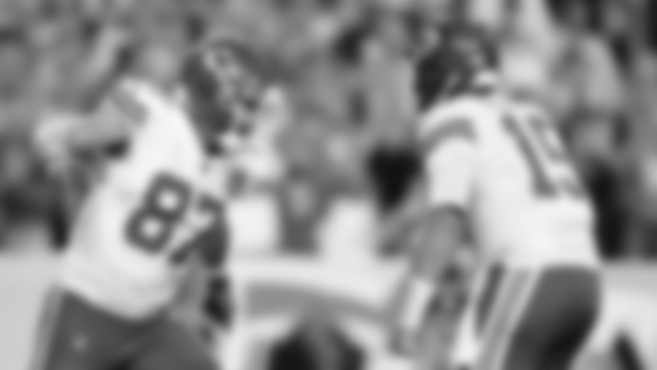 Kansas City Chiefs tight end Travis Kelce (87) and quarterback Patrick Mahomes (15) celebrate a touchdown during a week 11 NFL Football game against the Denver Broncos on Sunday, November 16, 2025 in Denver, Colorado.