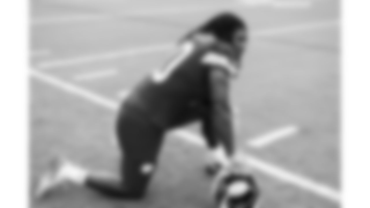 Kansas City Chiefs running back Isiah Pacheco (10) kneels during day 4 of training camp practice on Friday, July 25, 2025.