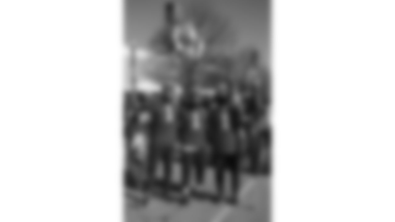 Chiefs Flag Runners prior to a week 15 NFL Football game against the Los Angeles Chargers on Sunday, December 14, 2025 in Kansas City, MO.