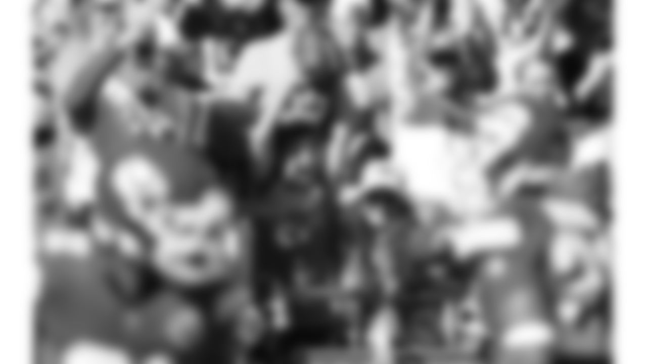 A young Kansas City Chiefs fan holds up a game ball during a week 7 NFL football game against the Las Vegas Raiders, Sunday, October 19, 2025 in Kansas City, MO.