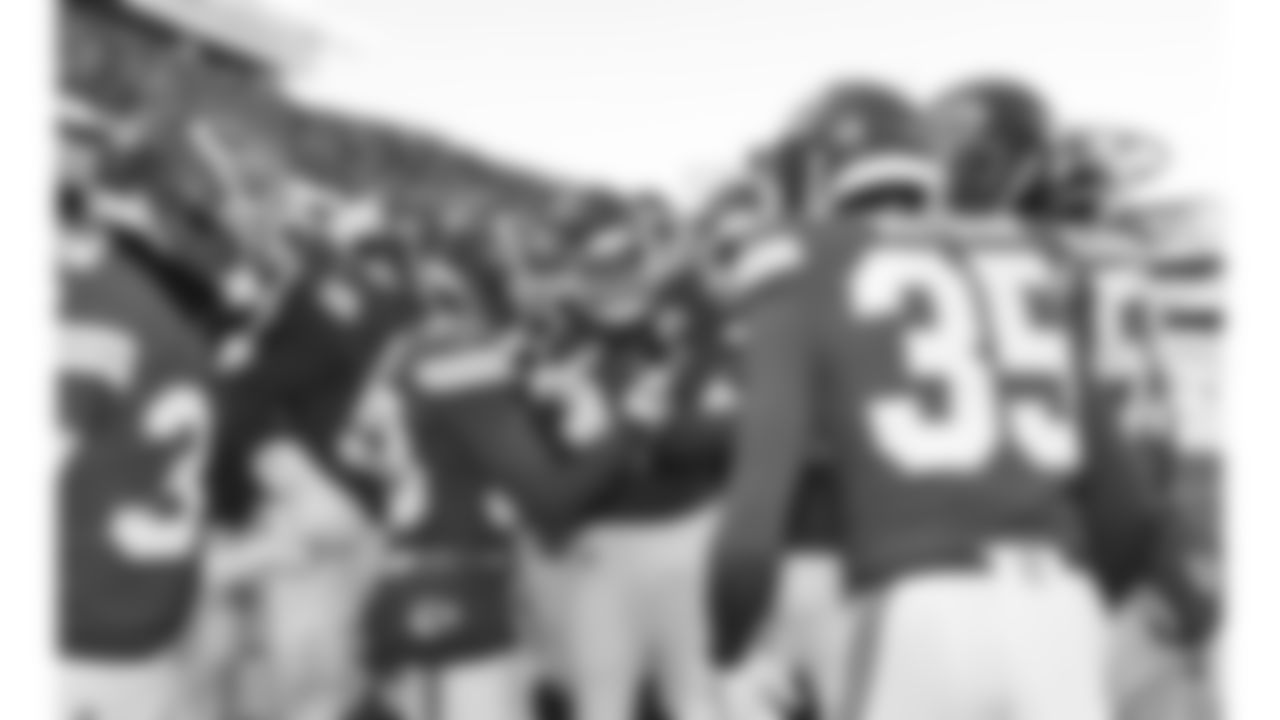 The Kansas City Chiefs defense celebrates in the end zone after an interception during a week 15 NFL football game against the Los Angeles Chargers, Sunday, December 14, 2025 in Kansas City, MO.