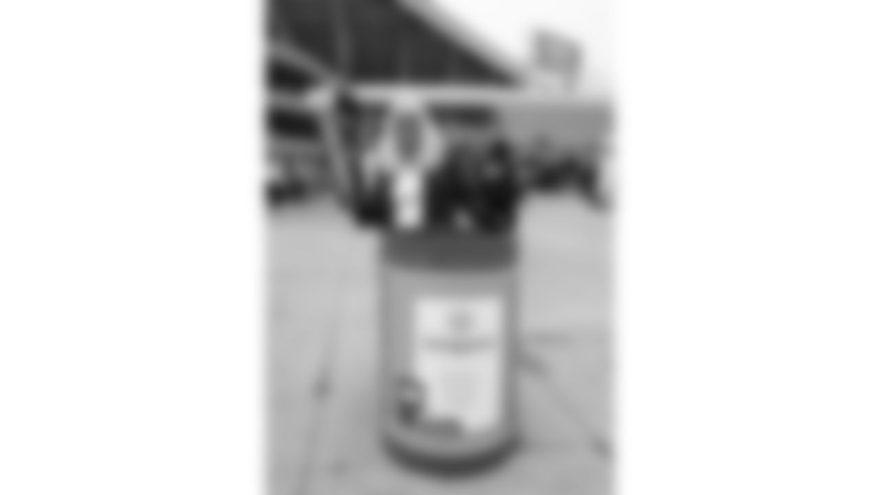 A Red Coater at a Toys For Tots donation bin prior to week 12 NFL Football game against the Indianapolis Colts on Sunday, November 23, 2025 in Kansas City, MO.