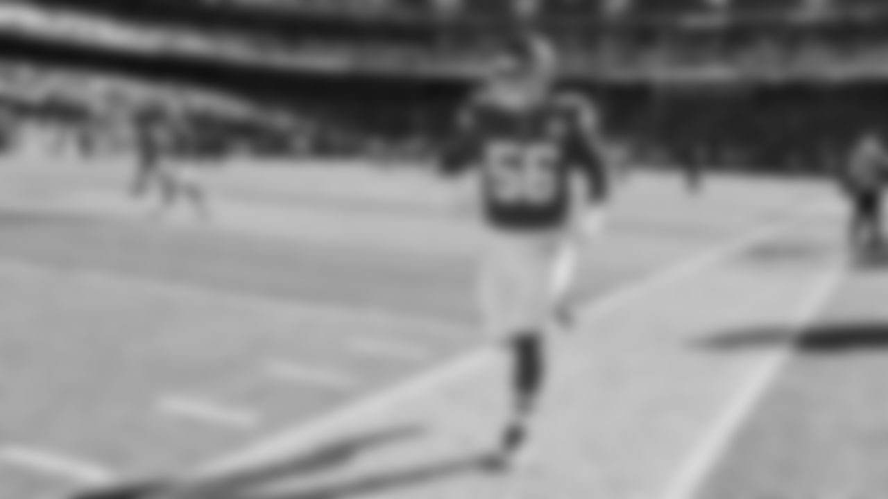 Kansas City Chiefs defensive end George Karlaftis (56) runs onto the field prior to an NFL week 15 matchup against the Los Angeles Chargers, Sunday December 14, 2025.