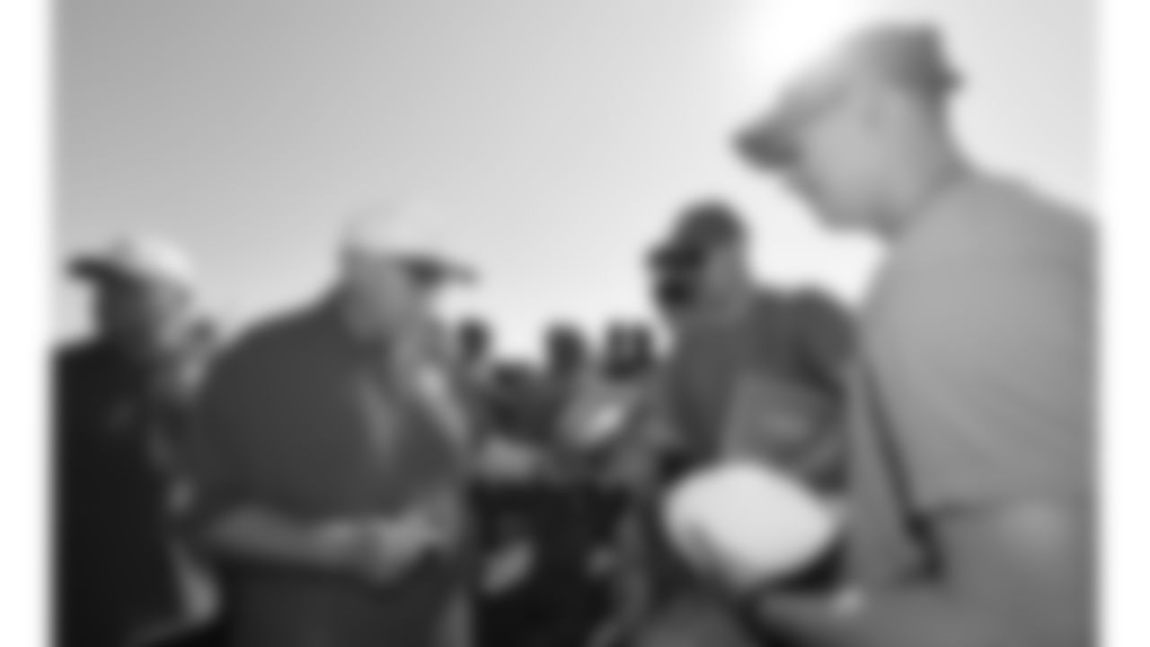 U.S. service members meet with Kansas City Chiefs Head Coach Andy Reid while attending Military Appreciation Day during day 17 of Training Camp practice on Wednesday, August 13, 2025.