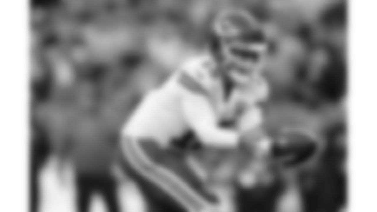 Kansas City Chiefs quarterback Patrick Mahomes (15) takes the snap during a week 11 NFL Football game against the Denver Broncos on Sunday, November 16, 2025 in Denver, Colorado.