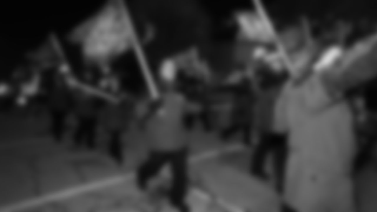 Red Coaters in the parade prior to an NFL week 14 matchup against the Houston Texans, Sunday December 7, 2025.