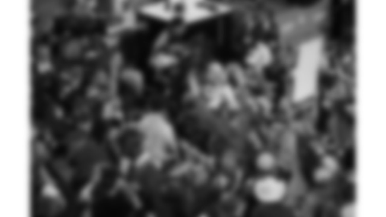 Kansas City Chiefs tight end Travis Kelce (87) tosses his gloves to a fan as he walks off the field following a week 17 NFL football game against the Denver Broncos, Thursday, December 25, 2025 in Kansas City, MO.