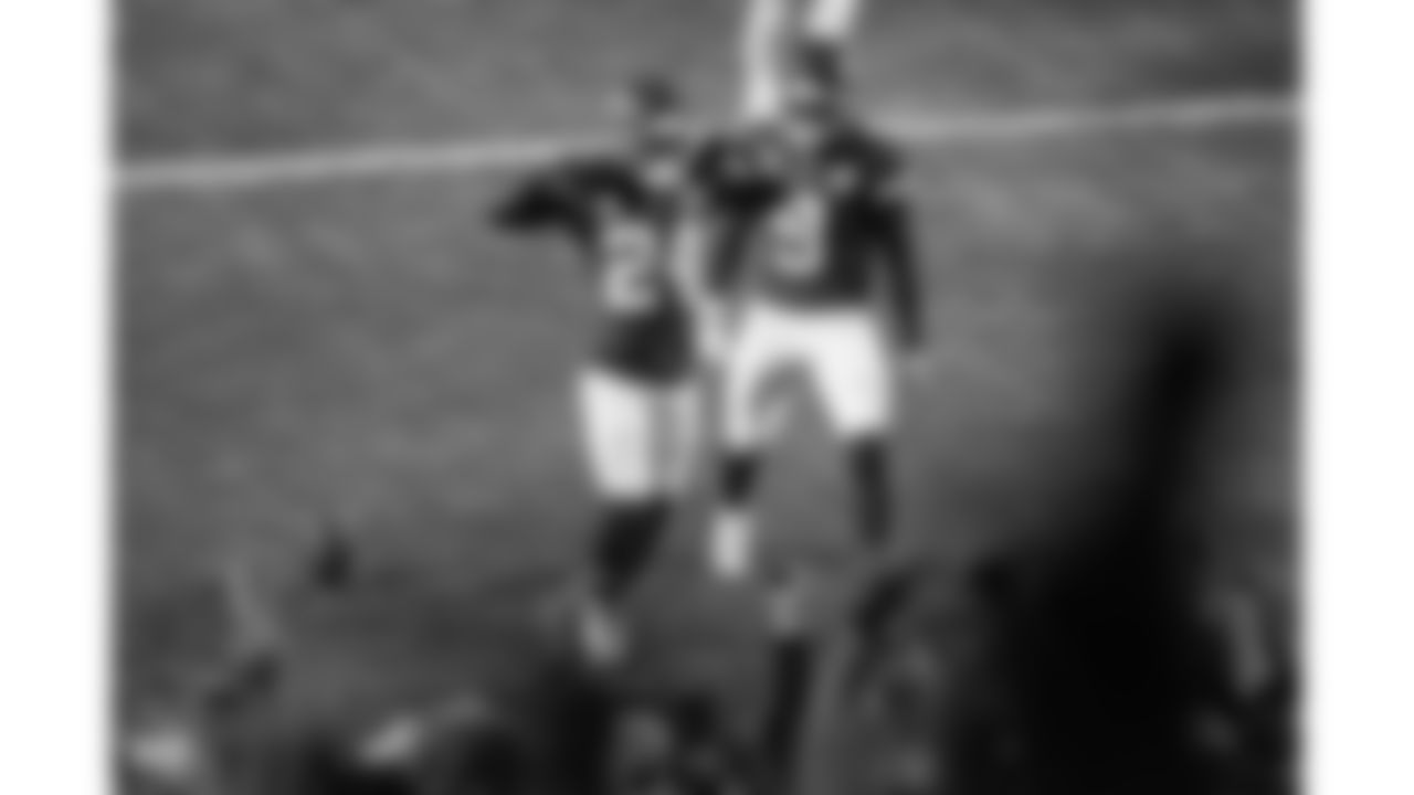 Kansas City Chiefs running back Brashard Smith (24) celebrates in the end zone with wide receiver JuJu Smith-Schuster (9) during a week 17 NFL football game against the Denver Broncos, Thursday, December 25, 2025 in Kansas City, MO.