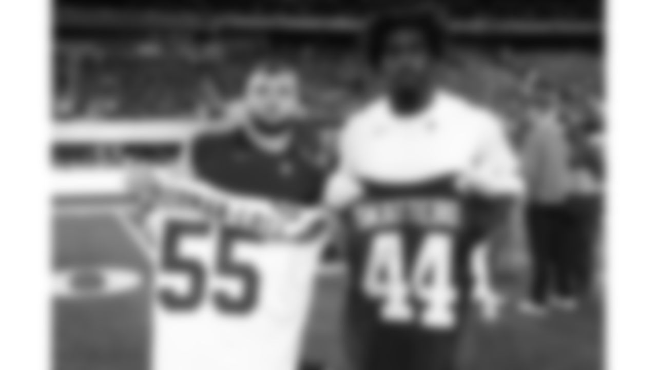Kansas City Chiefs defensive tackle Omar Norman-Lott (55) and New York Giant Cam Skattebo (44) after a week 3 NFL Football game against the New York Giants on Sunday, September 21, 2025 at MetLife Stadium in East Rutherford, New Jersey.